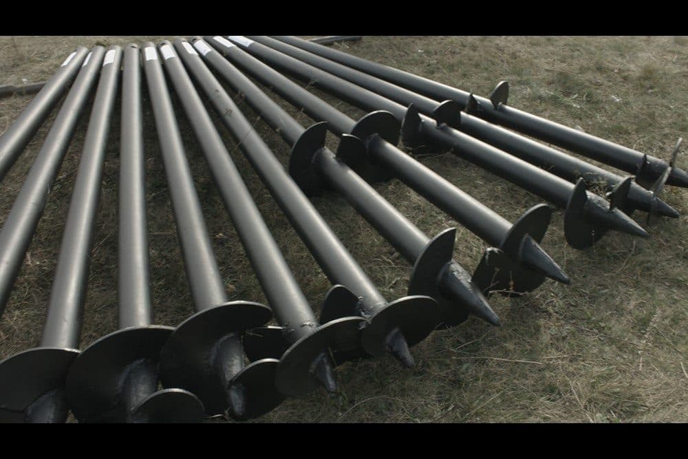 Helical piles already screwed into the ground